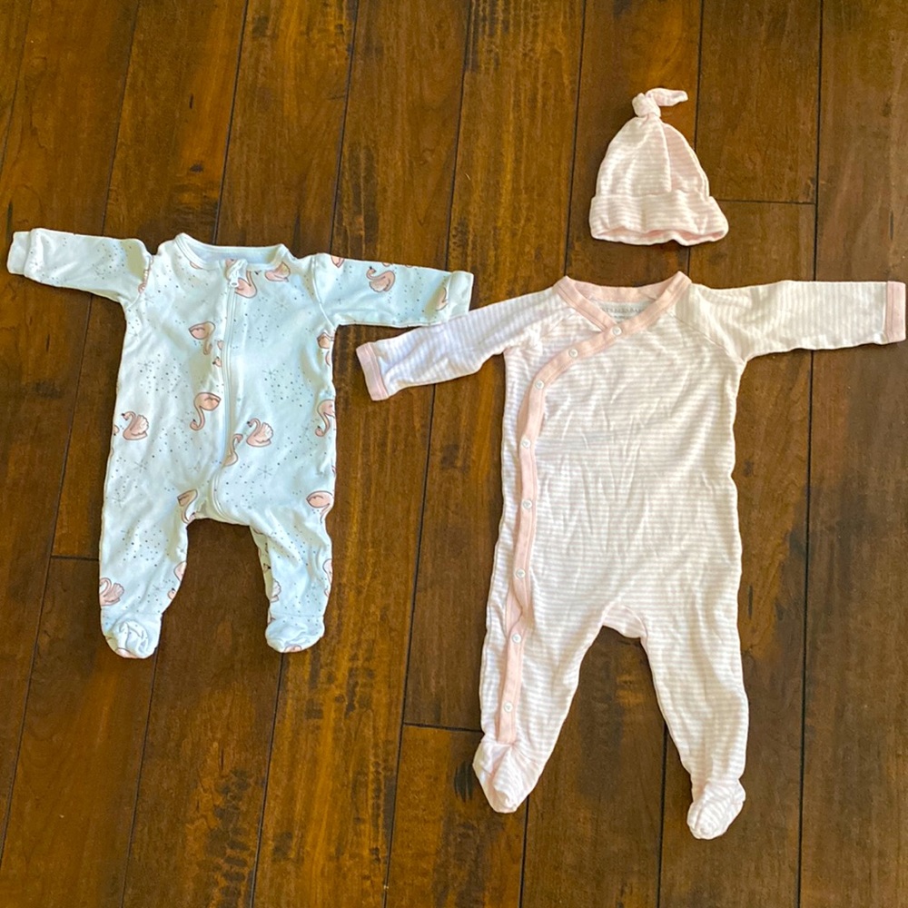 Two one piece Baby girl clothes one with a hat